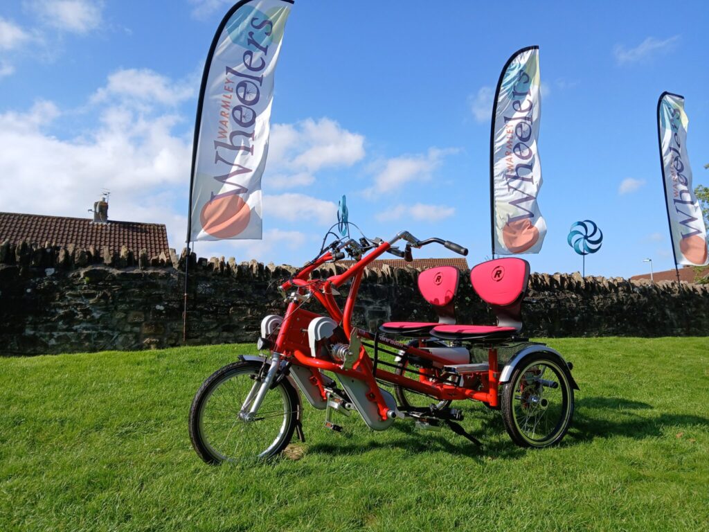 a red tandem bicycle